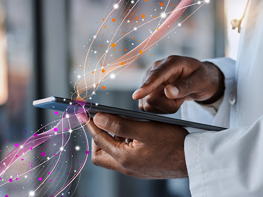 Doctor using tablet with data