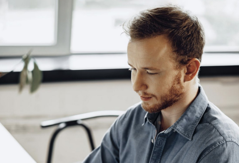 Academic researcher views a real‑time dashboard with enrollment and compliance metrics.